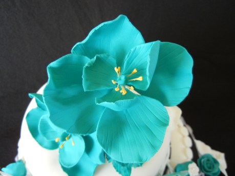 close up teal gum paste flower